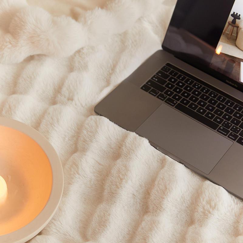 Decke mit Kopfkissenbezügen